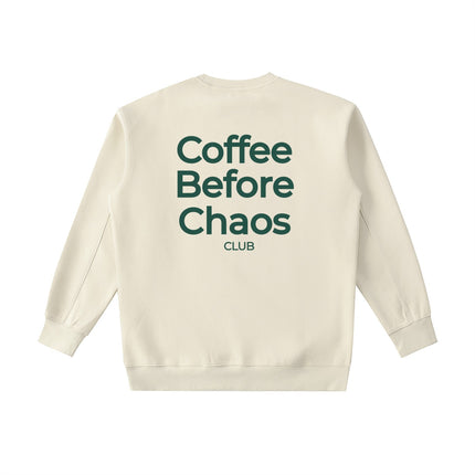 Tuvi Coffee Before Chaos crewneck sweatshirt in cream with dark green back graphic print.