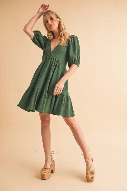 Aemi+Co Tied Back Ruffled Short Sleeve Mini Dress.