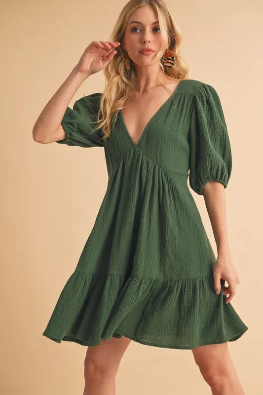 Aemi+Co Tied Back Ruffled Short Sleeve Mini Dress.