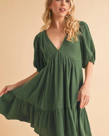 Aemi+Co Tied Back Ruffled Short Sleeve Mini Dress.
