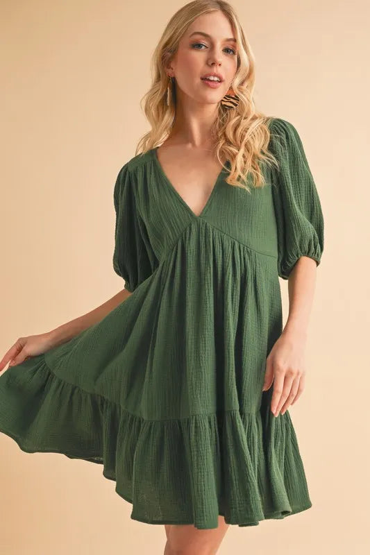 Aemi+Co Tied Back Ruffled Short Sleeve Mini Dress.