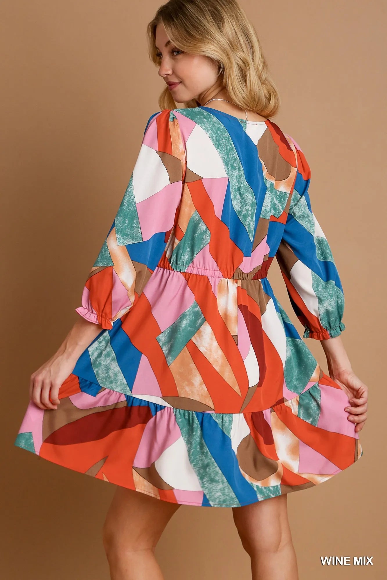 Abstract V-Neck Tiered Printed Dress.