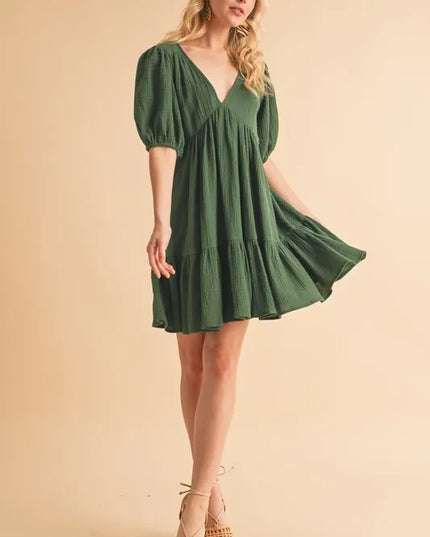 Aemi+Co Tied Back Ruffled Short Sleeve Mini Dress.