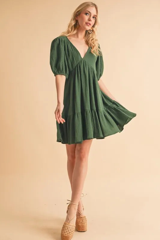 Aemi+Co Tied Back Ruffled Short Sleeve Mini Dress.