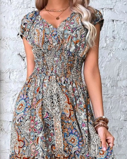 Full Size Smocked Printed V-Neck Cap Sleeve Dress Plus Size.