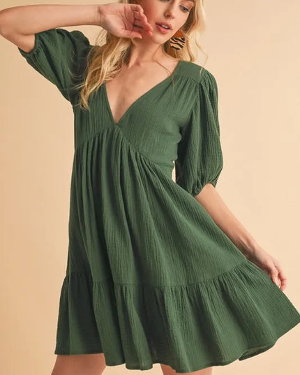 Aemi+Co Tied Back Ruffled Short Sleeve Mini Dress.