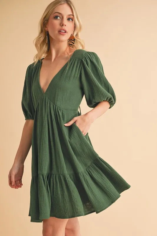 Aemi+Co Tied Back Ruffled Short Sleeve Mini Dress.