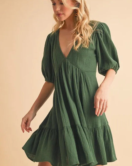 Aemi+Co Tied Back Ruffled Short Sleeve Mini Dress.