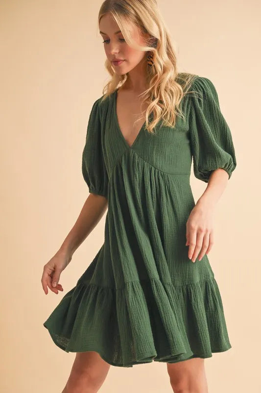 Aemi+Co Tied Back Ruffled Short Sleeve Mini Dress.