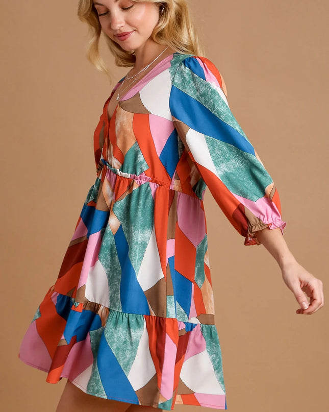 Abstract V-Neck Tiered Printed Dress.