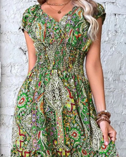 Full Size Smocked Printed V-Neck Cap Sleeve Dress Plus Size.