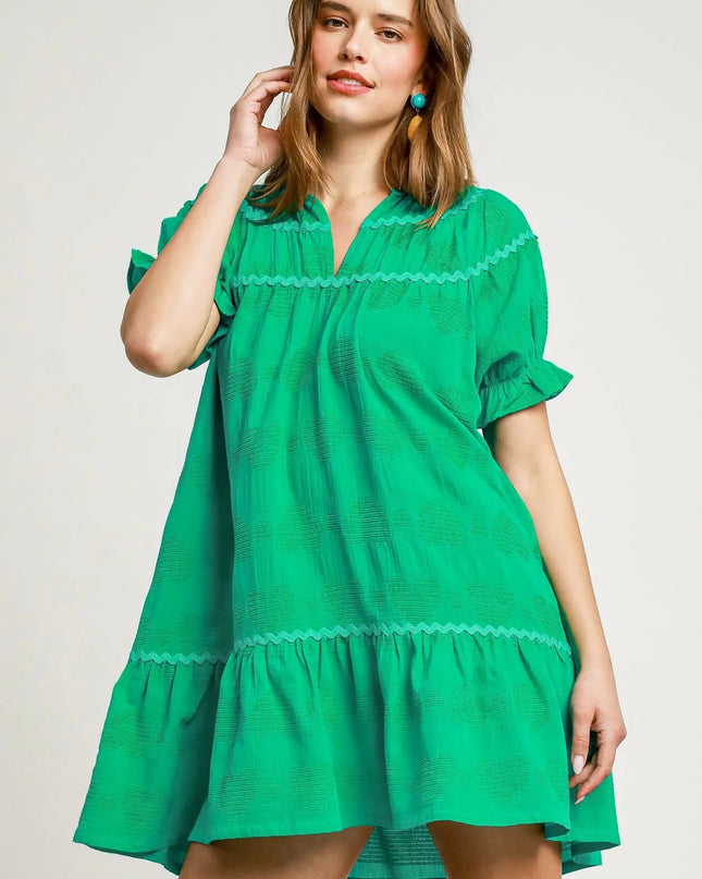 The Lanikai Short Sleeve Ruffle Babydoll Dress.